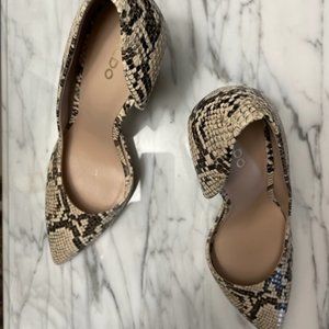 ALDO  Stendera chunky heel snake print with side cutout.